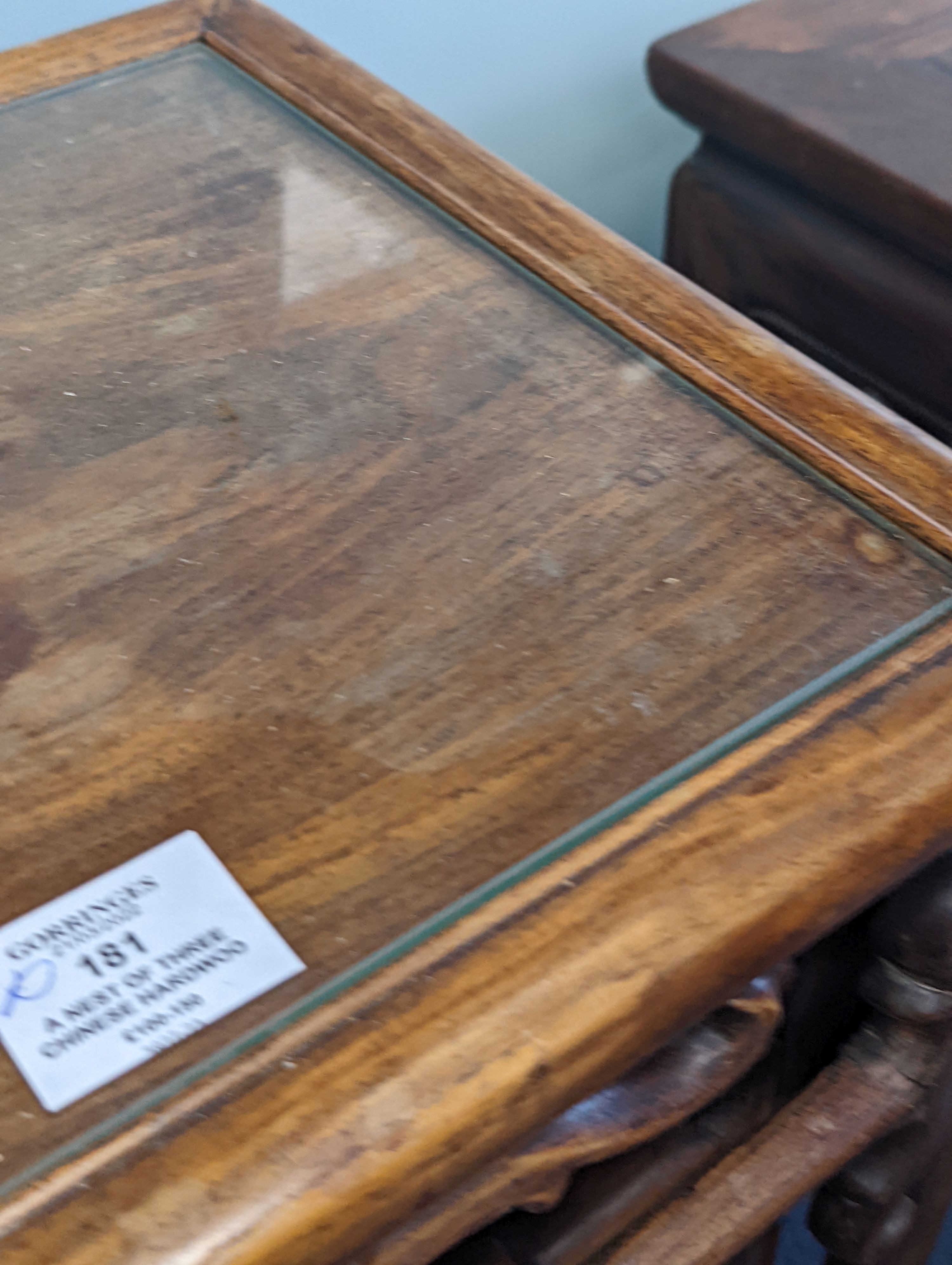 A nest of three Chinese hardwood tables, width 40cm, depth 32cm, height 59cm